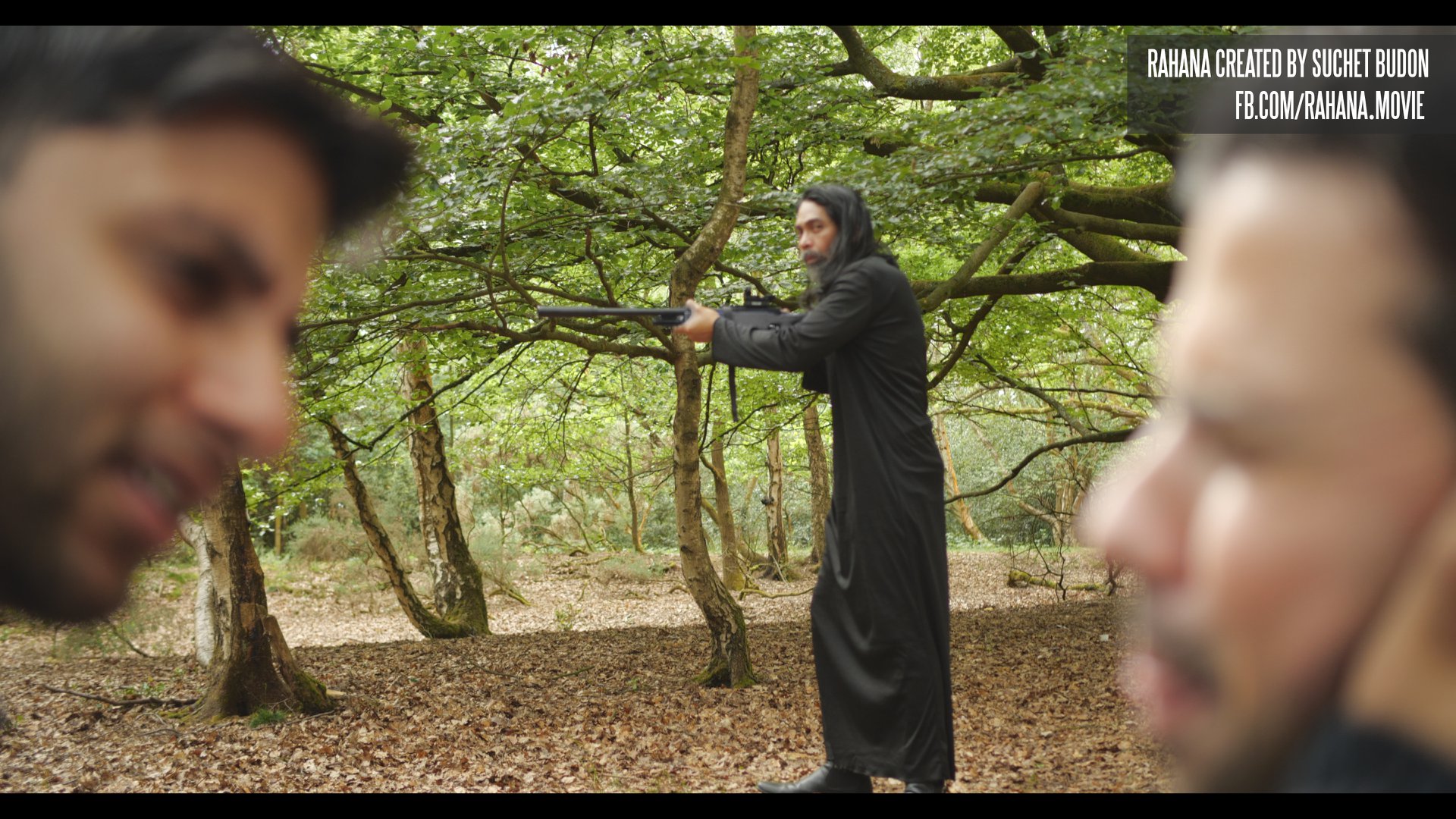 Padre Emilio (Jimmy Elizaga) stands watch and holds back lethal cult members as Salvadore (Adris Tariq) helps Alejandro (Josh Catalano) in RAHANA the movie directed by Suchet Budon